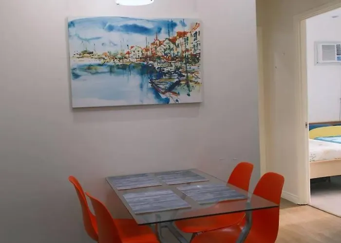 5-mins Sm Aura Cozy 2br Free Parking Apartment