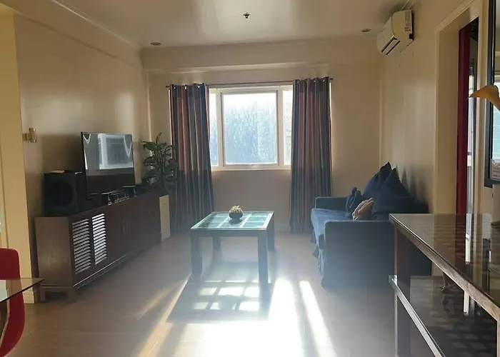 5-mins Sm Aura Cozy 2br Free Parking Apartment *
